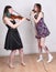 Girls singing and playing violin