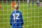 Girls ` Soccer Championships Match. Girl Soccer Goalkeeper. Young Girl Football Goalkeeper Standing in a Goal. Youth Football Team