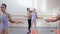 Girls study ballet gymnastics with the help of teacher, motivation and hard work