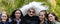 Girls taking a photo with a girl dressed as a drag queen nun at the Christopher Street Day CSD in Munich, Germany.