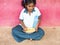 Girls teenagers pupils being served Meal plate of rice In government School Canteen. Unhealthy food for poor children. Loneliness