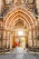 girls tourists friends hugging against the background of St. Peter`s Church in Leipzig