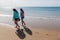 Girls Walking Beach Shoreline Ocean