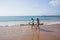 Girls Walking Beach Shoreline Ocean