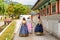 Girls wearing Korean traditional dress in Gyeongbokgung Palace