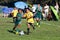 Girls Youth Soccer Football Players Running for the Ball