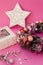 Girly christmas decoration. Floral wreath with baubles. Cute card with lights and gift box. Holiday decor for girl