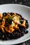 Girolles mushrooms with black rice