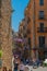 Girona medieval city, Tourists on vacation in the City, street view of Girona, vertical