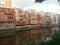 Girona, the river. Houses reflected on water.