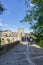 GIRONA, SPAIN - 11 OCTOBER 2020: Group of tourists visiting the Besalu bridge