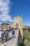 GIRONA, SPAIN - 11 OCTOBER 2020: People walking along the Besalu bridge