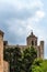 Girona, Spain, August 2018. Stormy sky over a tower with an angel on the roof.