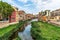 Girona, Spain, August 2019. Colorful buildings along the old moat.