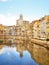 Girona town in river reflection