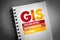 GIS - Geographic Information System acronym on notepad, concept background