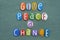 Give peace a chance, creative social issue phrase compose with multi colored stone letters