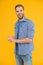 Giving man sense of style. Stylish guy yellow background. Happy man in casual style. Mens fashion. Style trends