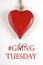 #Giving Tuesday with red heart on white - veritcal.