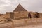 The giza plateau in the sahara desert. great pyramids