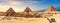 Giza Pyramids and Sphinx panorama with a camel lying by, Cairo, Egypt