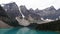 Glacial water of Moraine Lake with mountains and forests, Banff, Canada