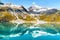 Glacier Bay National Park, Alaska, USA. Amazing glacial landscape showing mountain peaks and glaciers on clear blue sky