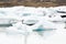 Glacier edge and water with reflections