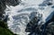 Glacier ice blocks falling from the mountain