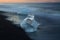 Glacier ice chunks on the black beach at Jokulsarlon, Iceland