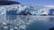 Glacier with ice floating in water Alaska