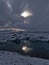 Glacier lagoon JÃ¶kulsÃ¡rlÃ³n, located in southern Iceland in VatnajÃ¶kull national park, with floating icebergs and sun shining.