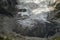 Glacier Lardaad Adishi icefall and tongue with small waterfall on it moraine and kar in mountains of Svaneti Georgia