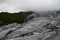 Glacier Meets Green Mossy Mountain