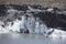 Glacier melting into a lake in summer - Solheimajokull, Iceland