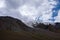 Glacier on rocky mountains. Melting glaciers due to global warming climate change problem. Barskoon mountain pass. Travel tourism