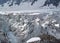 Glacier on Tetnuldi mountain, rocky peaks with snow in Svanetia Caucasian mountains in Georgia