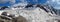 Glacier on Tetnuldi mountain, rocky peaks with snow in Svanetia Caucasian mountains in Georgia