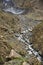 The glaciers covered by the old volcanic rock descend to the edge of Shimshal village, bringing with them the water