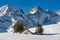 The glaciers and mountain peaks of the Ecrins National Park with La Chappelle des FusillÃ©s in Winter. Hautes-Alpes, France