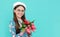 glad child in beret with tulips. mothers or womens day. kid in eyeglasses