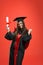 Glad girl with bachelor, master degree holding diploma.