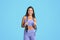 Glad millennial caucasian slim woman in sportswear with skipping rope, enjoy workout