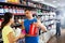 Glad salesman offering supplements to woman