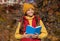 glad teen child read school book in autumn