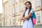 glad teenage school girl with backpack, copy space. teenage school girl outdoor.