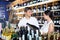 Glad young couple choosing together wine