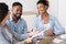 Gladful African American Couple Listening To Financial Counselor`s Advice