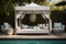 glamorous poolside cabana with chaise lounge and cocktail shaker