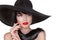 Glamour Fashion Brunette Woman Portrait in black hat isolated on